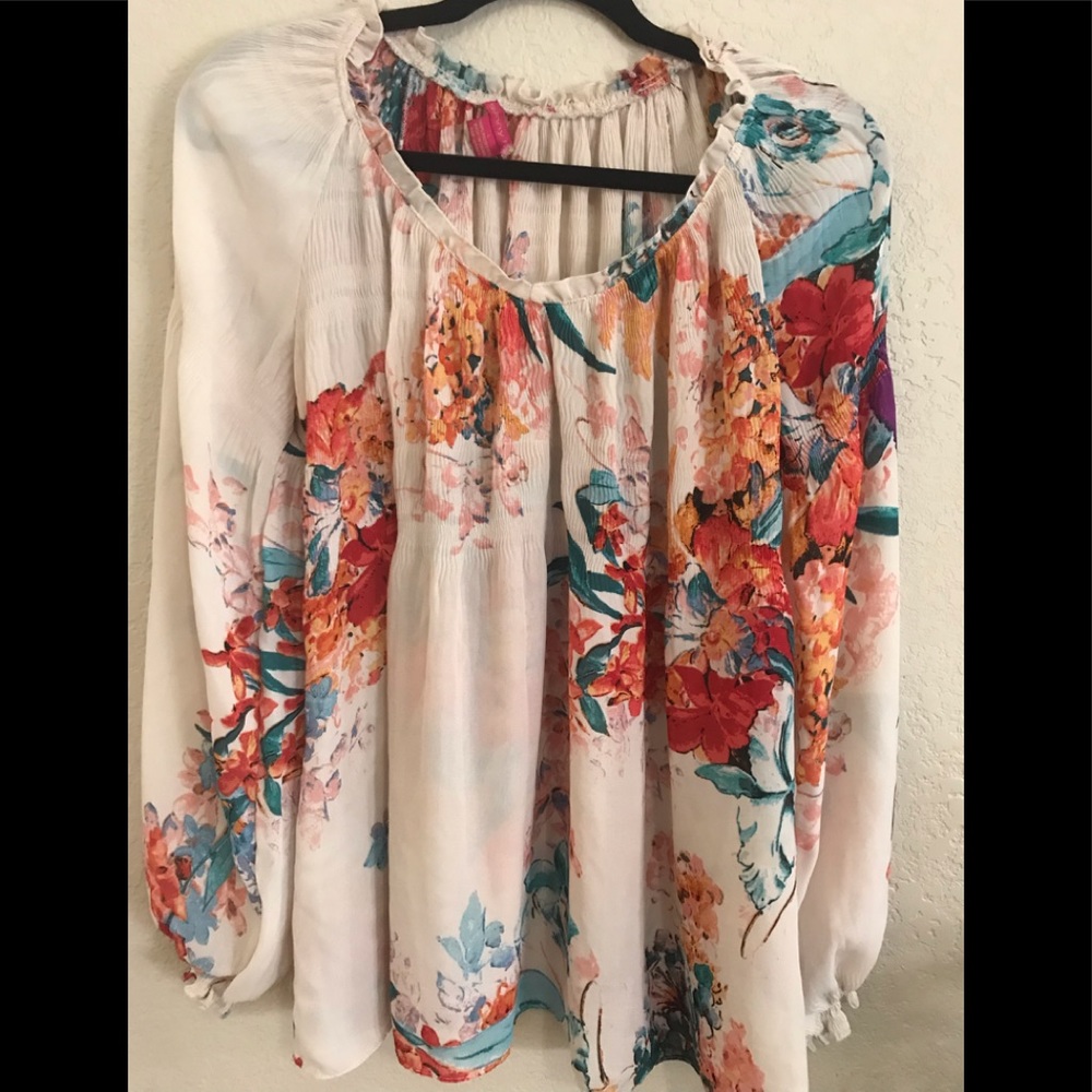 Cream and floral blouse